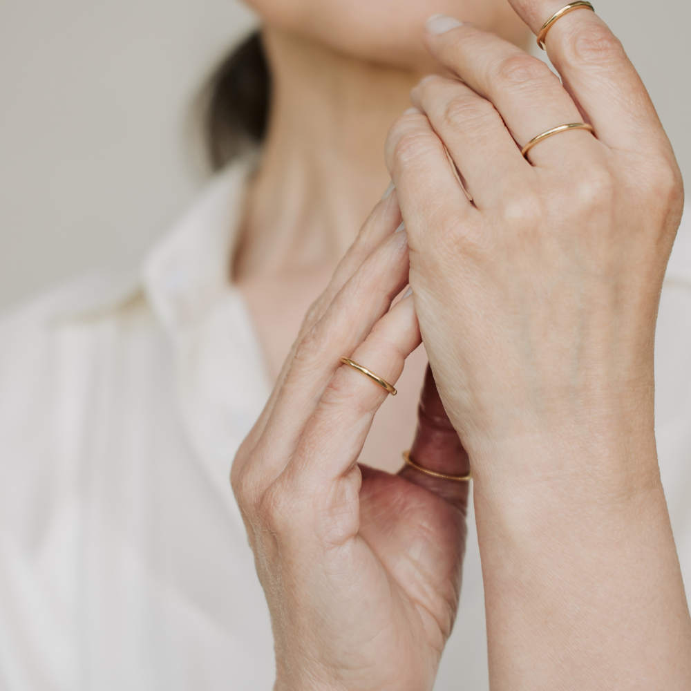 woman posing with minimalist rings 